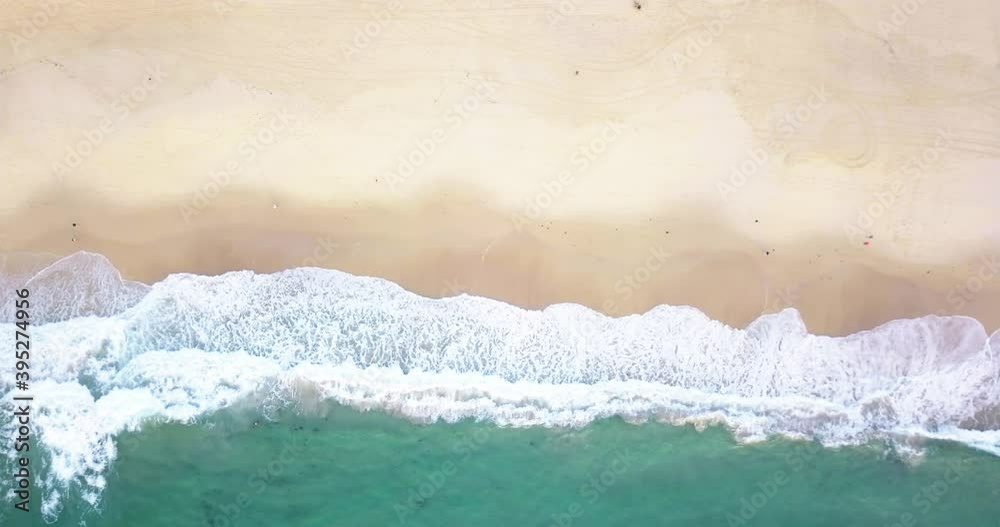 Foamy Ocean Waves Splashing On The Sand - Bondi Beach In Sydney, Australia - top-down drone, slow motion Foamy Ocean Waves Splashing On The Sand - Bondi Beach In Sydney, Australia - top-down drone, slow motion