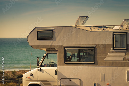 Caravan camping on sea shore, Spain