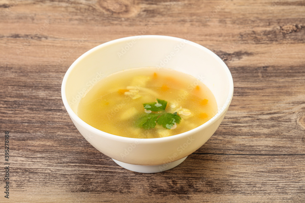 Tasty chicken soup with carrot Tasty chicken soup with carrot