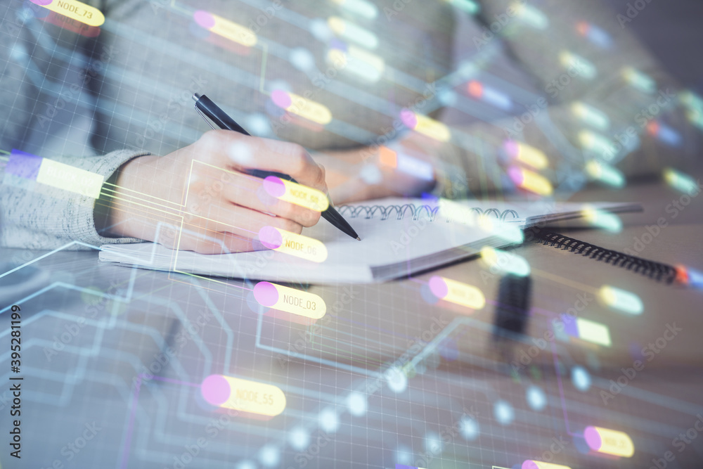 Double exposure of writing hand on background with data technology hologram. Big data concept. Double exposure of writing hand on background with data technology hologram. Big data concept.
