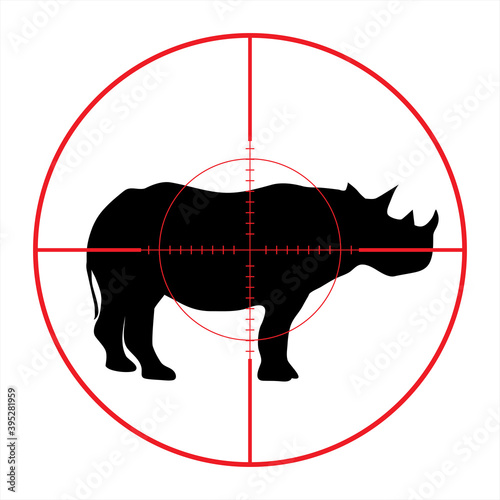 Vector silhouette of rhinoceros in rifle sight while hunting. The African creatures in focus.