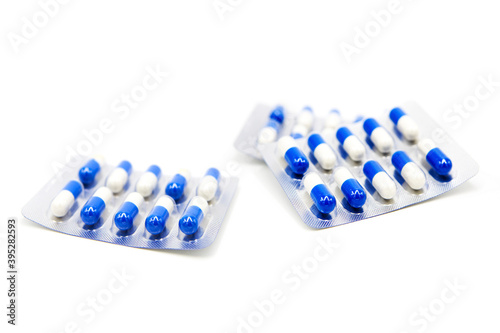 Blister packs of pills isolated on white background. Tablets in packaging. Healing of disease. Medicine and Pharmacology.
