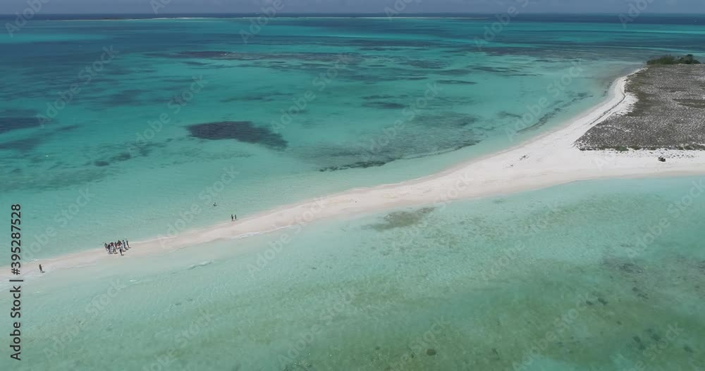 Cayo de agua Los Roques venezuela righ to left tracking drone aerial view ,backward movement Amazing tropical island Cayo de agua Los Roques venezuela righ to left tracking drone aerial view ,backward movement Amazing tropical island