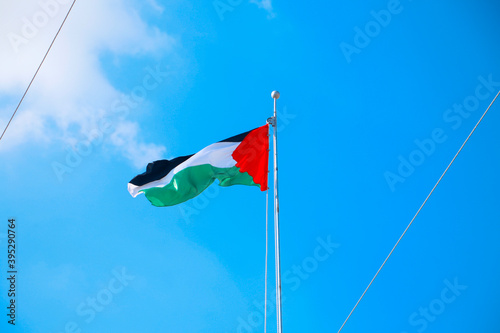 Palestinian flag, blue sky