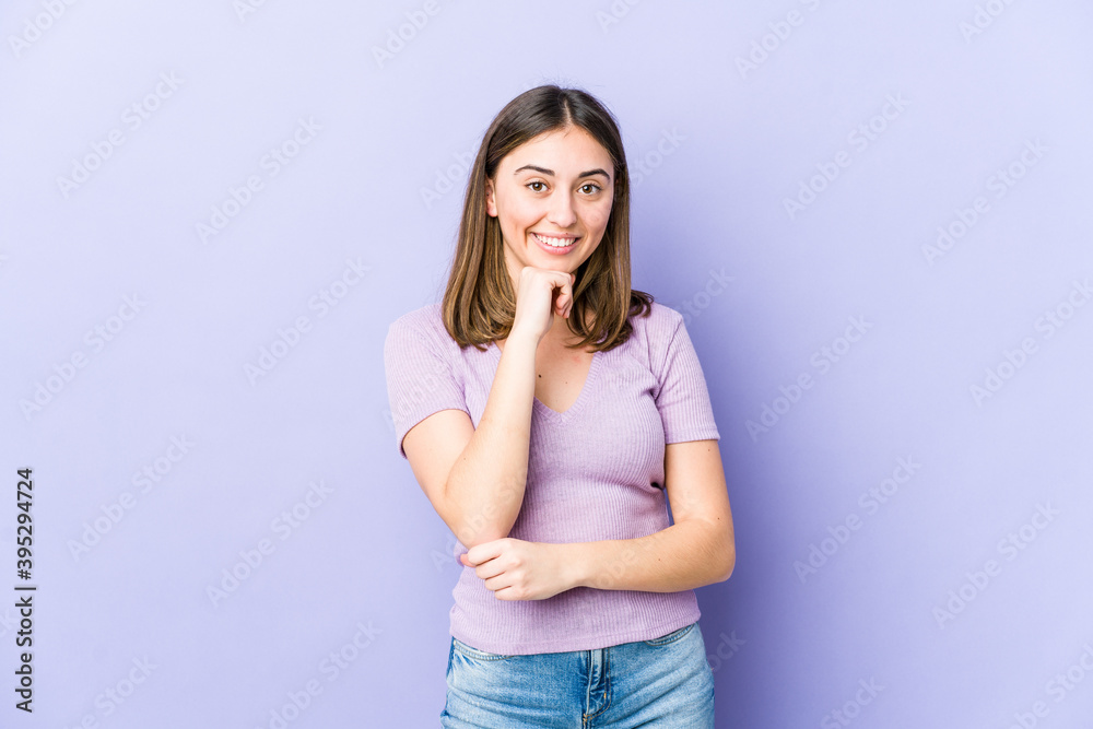 Young caucasian woman smiling happy and confident, touching chin with hand. Young caucasian woman smiling happy and confident, touching chin with hand.