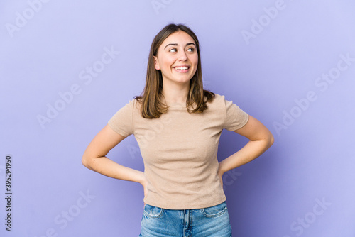 Young caucasian woman relaxed and happy laughing, neck stretched showing teeth.