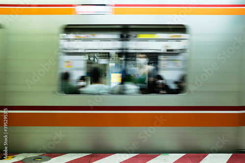 Photography Subway train leaving a station in Tokyo, Japan