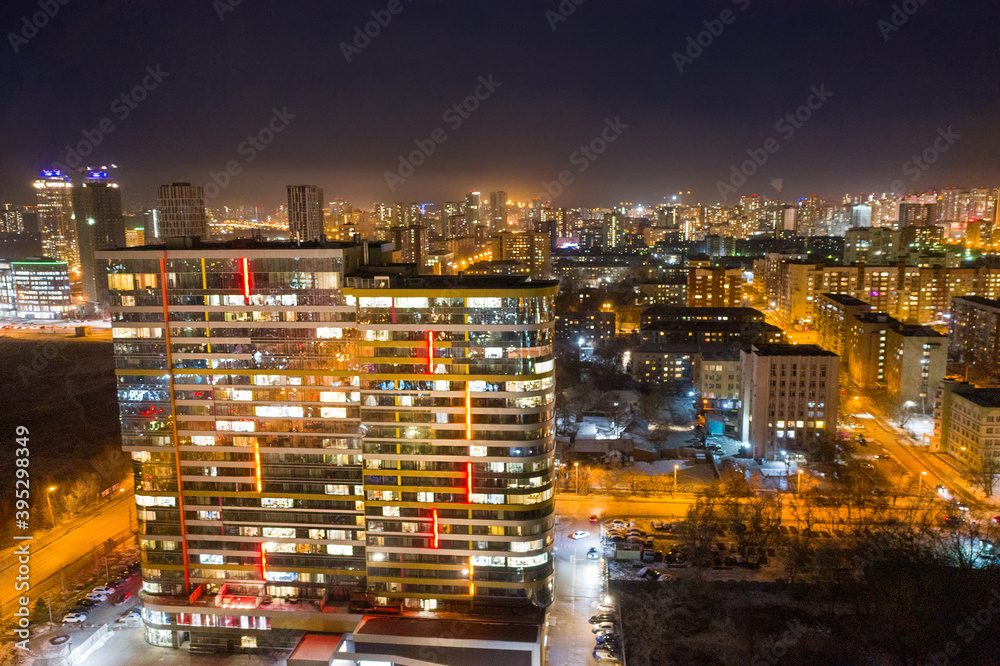 Top view of the night modern city. Bright lights of the night streets. Ekaterinburg. Russia