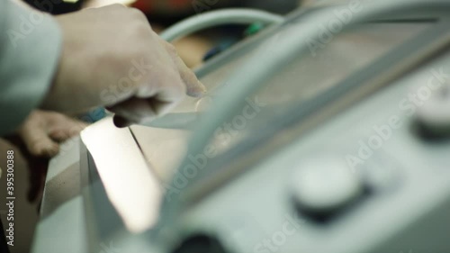 Worker typing on touch monitor in factory 4k PRORES Footage photo