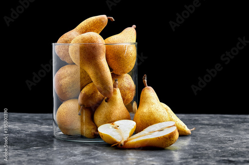 Ripe yellow pears on stone rustic background. Summer fruits  harvest.
