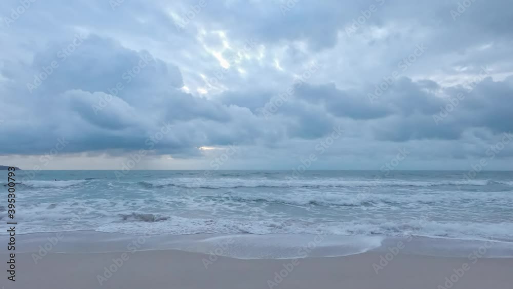 timelapse of beach with clouds in bright sunny day clear blue sky in summer time. sea foam wave clashing the shore. paradise in nature, travel in tropical country.