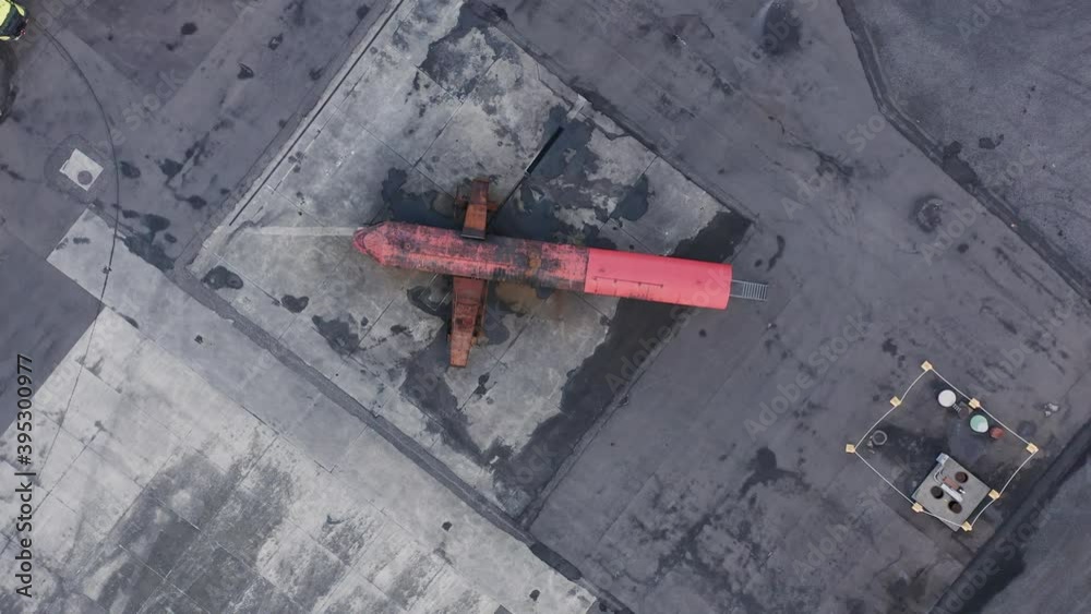 Directly above burned fuselage of dummy airplane for aviation training Directly above burned fuselage of dummy airplane for aviation training