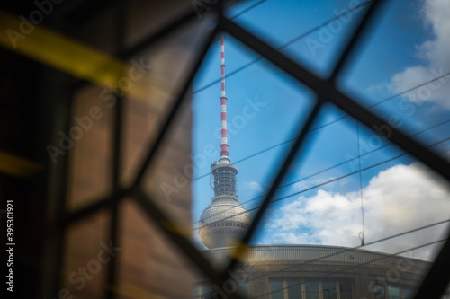 Photography view on berlin tv tower through glass window