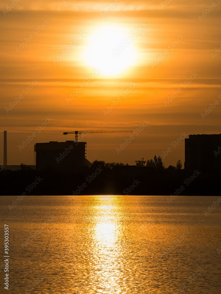 Beautiful sunset over Lake Dâmbovița (Lacul Morii) in Bucharest, Romania. Beautiful sunset over Lake Dâmbovița (Lacul Morii) in Bucharest, Romania.