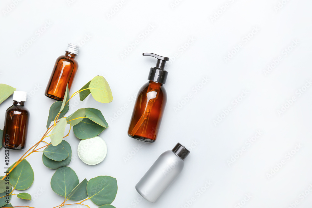 Composition with bath cosmetics on light background Composition with bath cosmetics on light background
