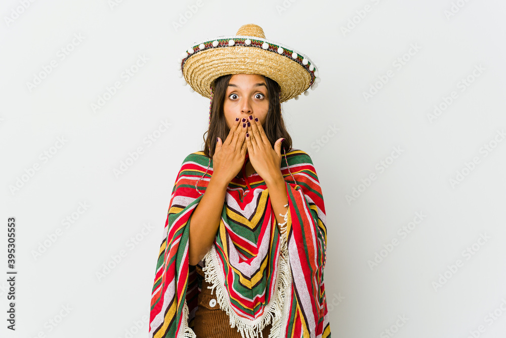 Young mexican woman isolated on white background