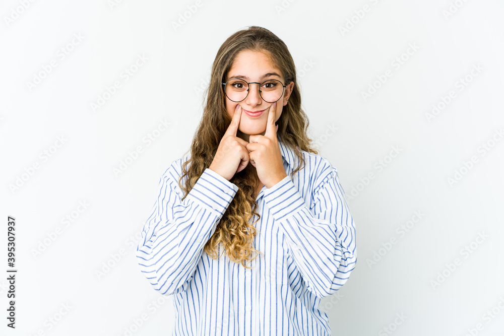 Young caucasian woman doubting between two options. Young caucasian woman doubting between two options.