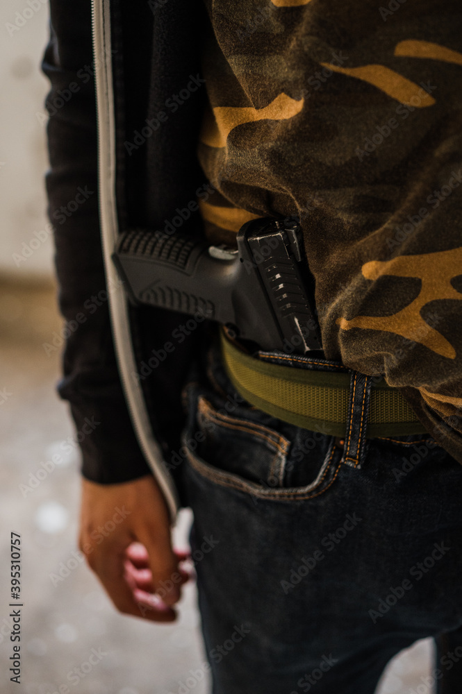 Police woman swat member arresting armed criminal in the abandoned building. Police woman swat member arresting armed criminal in the abandoned building.