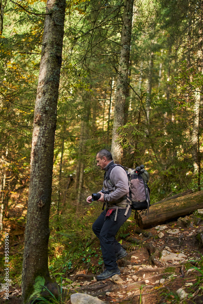 Professional nature photographer hiking