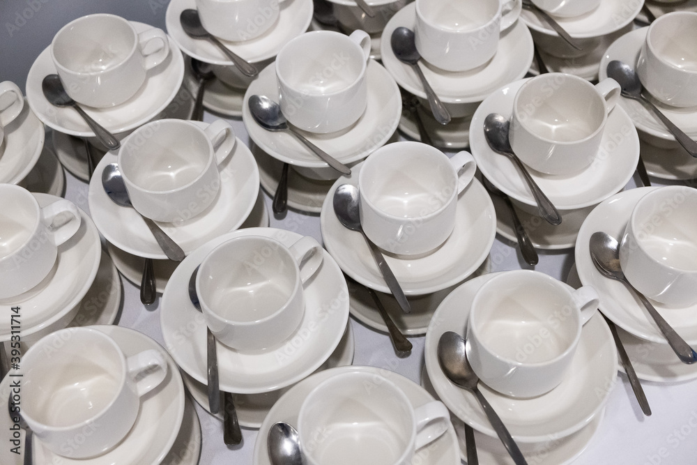 catering, many small white cups with spoons catering, many small white cups with spoons