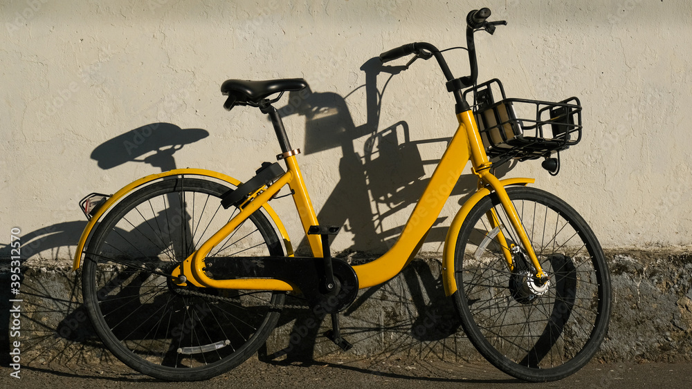 The yellow bike in sharing project. bicycles of the urban bike-sharing to move into ecologically city. 