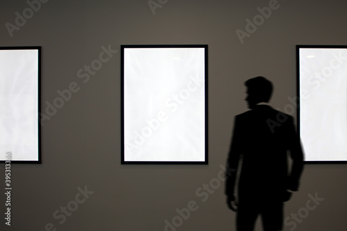 businessman buy picture in the artgallery museum exhibition  © Ksenia