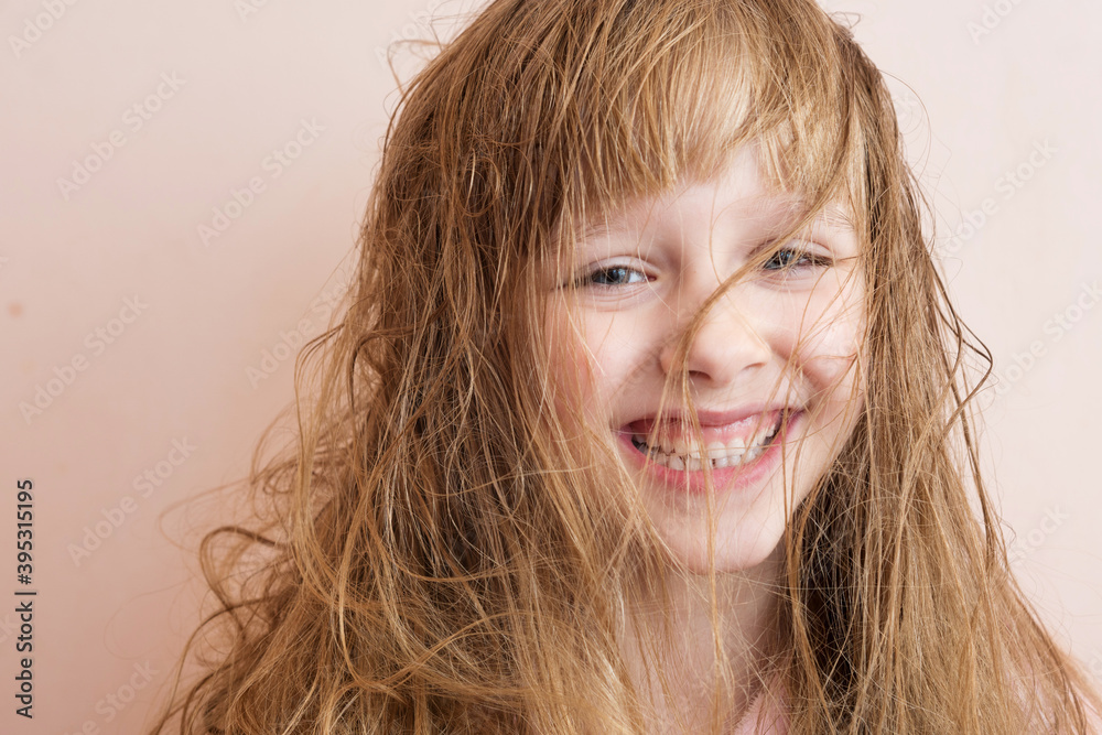 a blonde girl with very matted hair laughs a blonde girl with very matted hair laughs