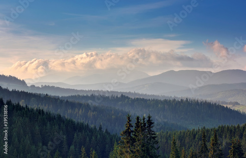 Beautiful landscape in the mountains. Sunrise. Early morning light lay on a mountain hill. © nmelnychuk