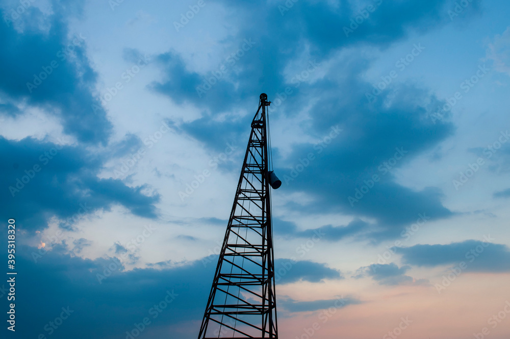 Piling Machine in the Silhouette Evening Sky Piling Machine in the Silhouette Evening Sky
