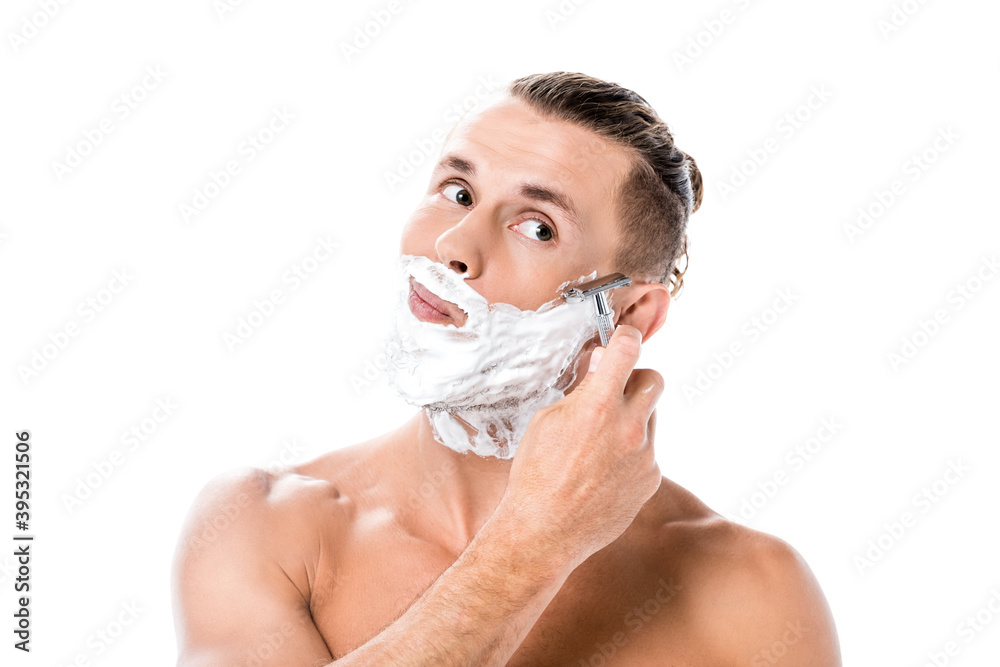  shirtless man with foam on face shaving isolated on white