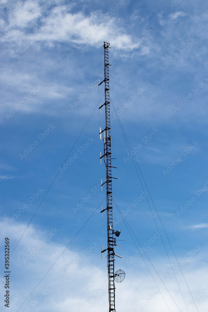 Tall radio communication antenna mast or mobile tower. Tall radio communication antenna mast or mobile tower.