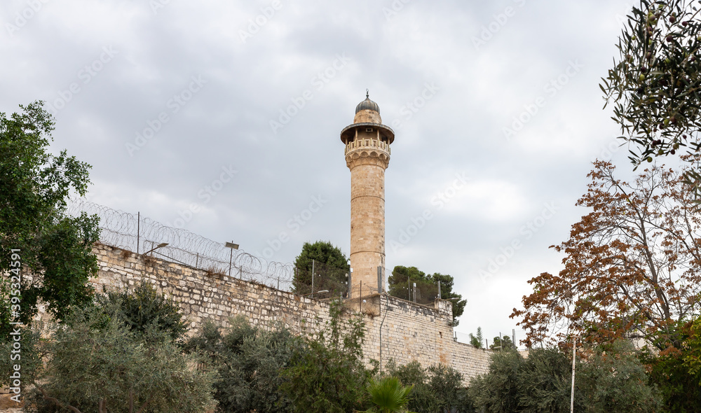 Minaret  of the Sheikh Reihan Mosque towers over the walls of the Temple Mount in the old city of Jerusalem, in Israel