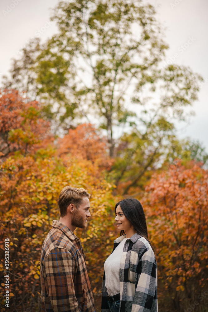 Beautiful happy couple smiling and looking each other Beautiful happy couple smiling and looking each other