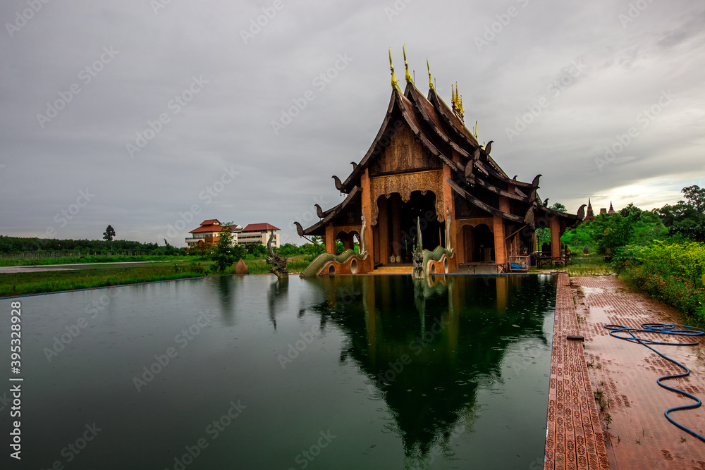 The background of a bridge or a walkway to admire the mountain scenery resembles a Phaya Naga mortgage statue, (Wat Phra Bat Phu Pan Kham) in Khon Kaen Province, Thailand.
