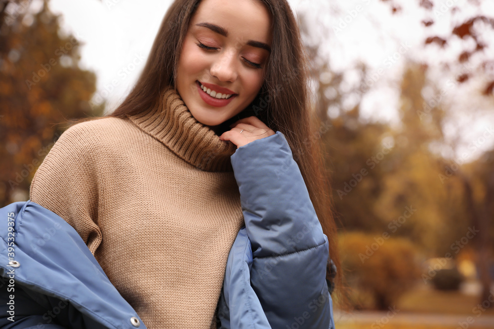 Young woman wearing stylish clothes in autumn park Young woman wearing stylish clothes in autumn park