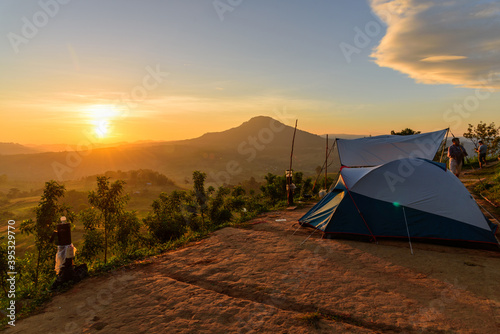 camping at high mountain with sunlight in morning time