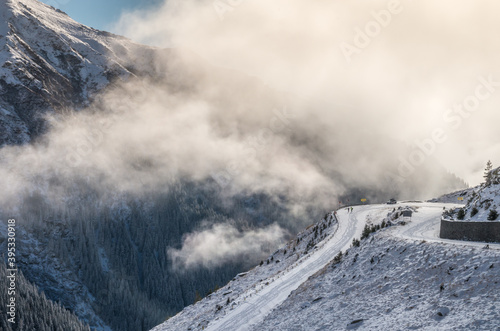 Stunning view of Fagaras mountains in winter. The ridge of the mountain full of snow. There are one of the beautiful road in the world, Transfagarasan