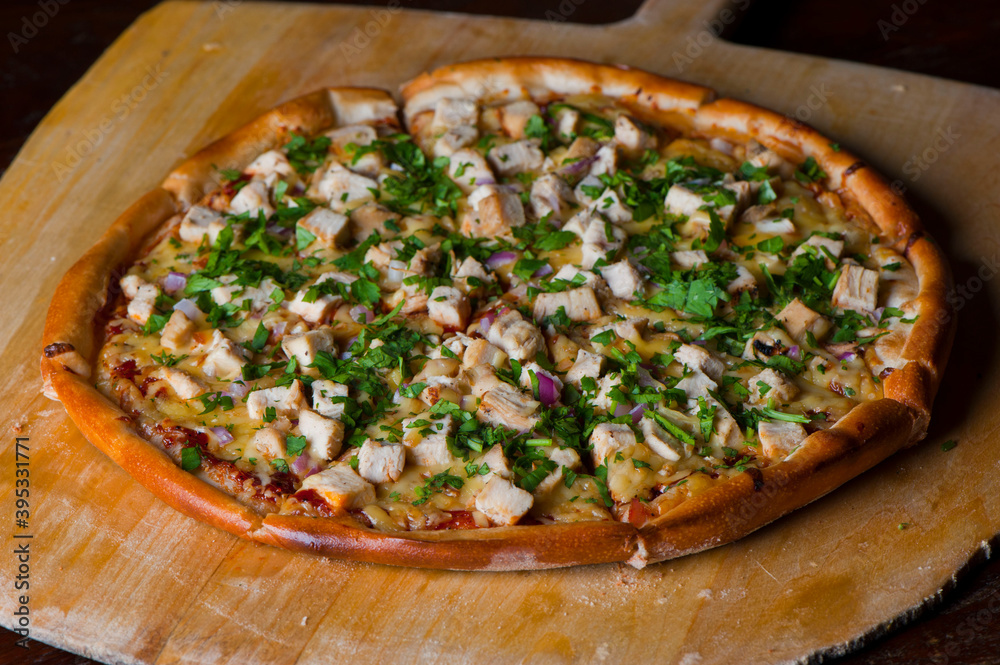 Pizza. Hand rolled pizza dough, topped with homemade tomato sauce