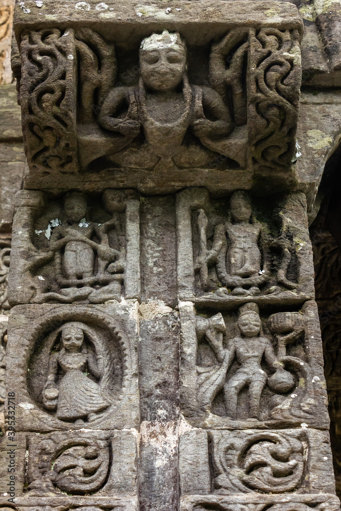 Ancient stone carvings on the walls of a HIndu temple