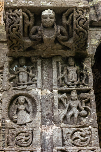 Ancient stone carvings on the walls of a HIndu temple