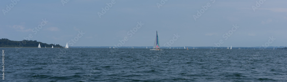 Chiemsee, Germany - August 25, 2019: sailboats on the lake 