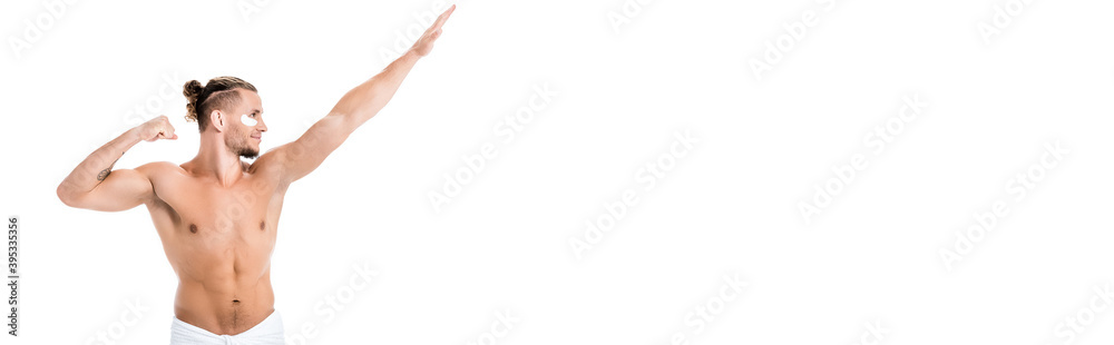 shirtless man in towel with eye patches on face showing muscles isolated on white, banner shirtless man in towel with eye patches on face showing muscles isolated on white, banner