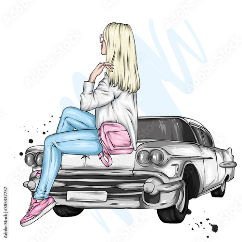 Beautiful girl in stylish clothes sits on a retro car

