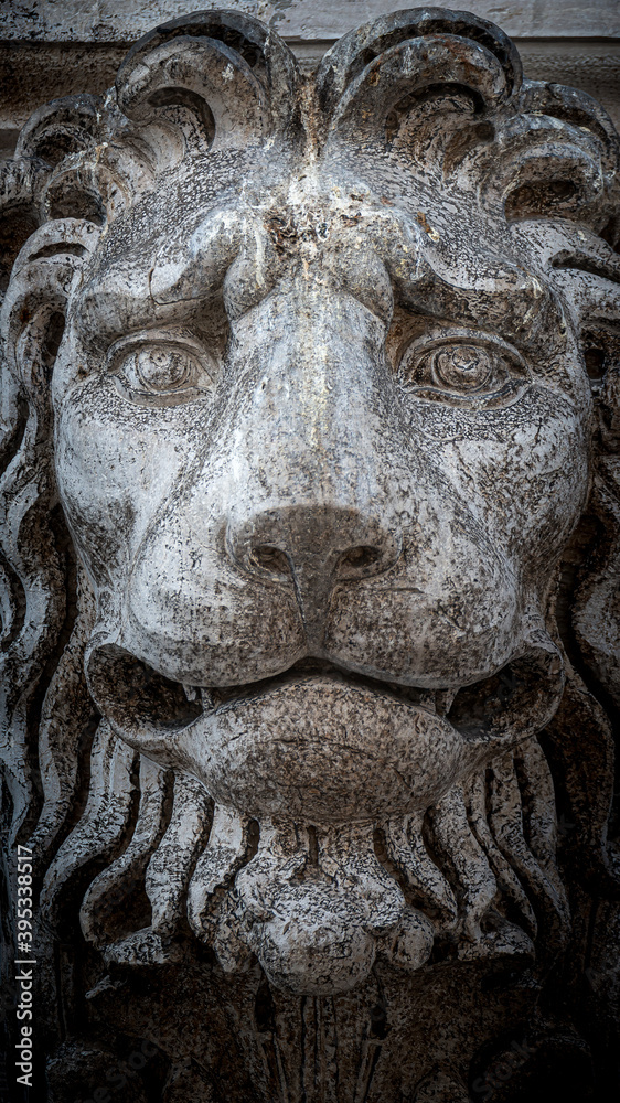Ancient decoration element of scary lion head at roof of Basilica San Marco and Doge Palace in Venice, Italy Ancient decoration element of scary lion head at roof of Basilica San Marco and Doge Palace in Venice, Italy