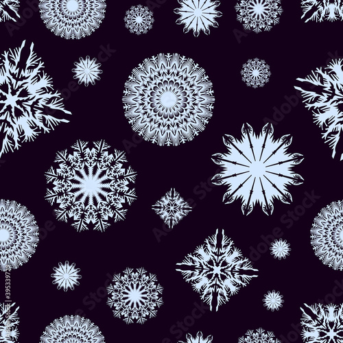 Vector seamless pattern with snowflakes on black background for New Year and Christmas holidays decoration.