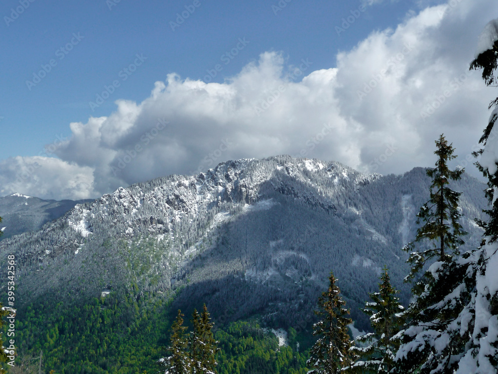Winter mountain hiking to Ochsensitz mountain, Bavaria, Germany