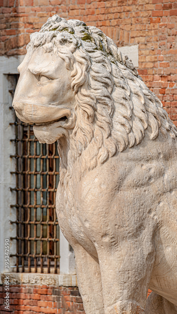 Ancient Venetian Piraeus lion head near Arsenal in Venice, Italy, closeup, details Ancient Venetian Piraeus lion head near Arsenal in Venice, Italy, closeup, details