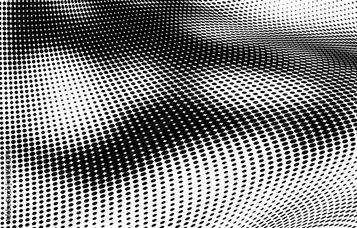 The halftone texture is monochrome. A wave of dots. Abstract black and white texture. Ink dots randomly placed on a white background. Pop art texture for printing on wrapping paper, business cards