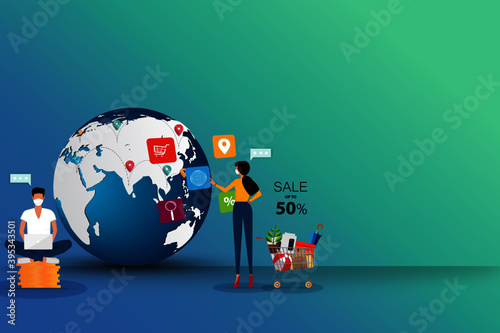 Concept of online shopping, young woman is standing near supermarket basket and touching on icon of browser to search for a goods together with a man who sit on top of coin stack.