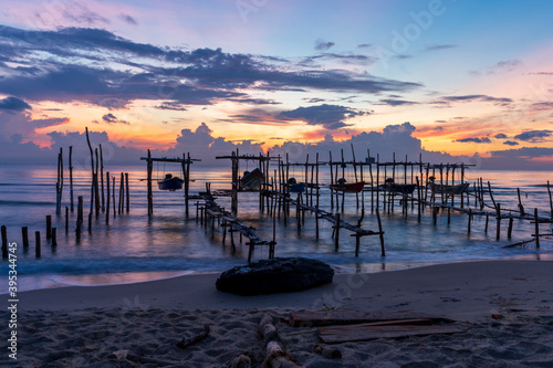 Obraz na płótnie Morning view before sunrise Fishing boat's harbor service at Bang Hoi Beach, Songlkhla, Thailand. w salonie